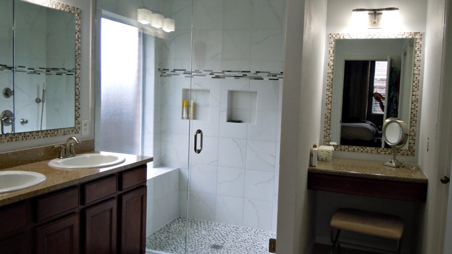 large, walk-in shower, double-sink vanity and separate vanity